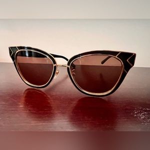 black and gold Tory Burch sunglasses
